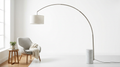 Lumen adjustable arc floor lamp with marble base and brass stem